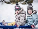 toddler girls sledging