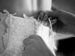 tying wedding dress