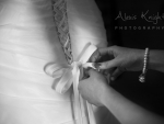 tying wedding dress