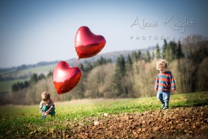 children heart balloons logo
